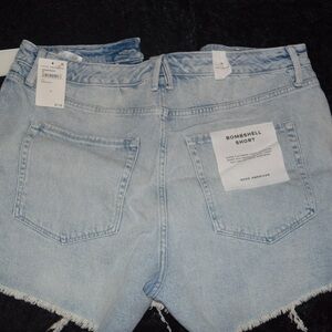 Good American ‘Bombshell’ Light Blue Denim Shorts